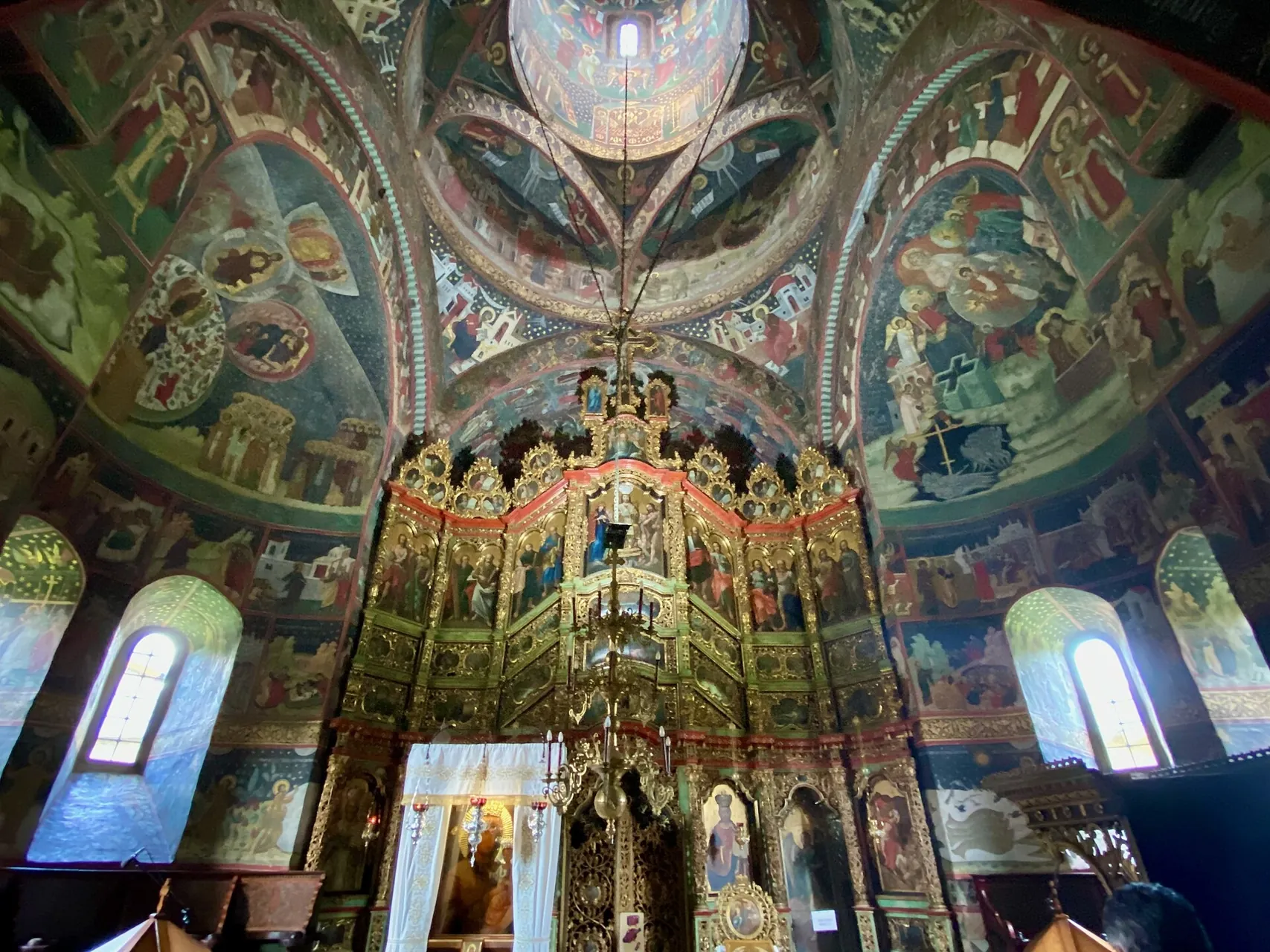 Interior of Sucevița Monastery, Romania (iconostasis and frescoes)